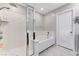 Bright bathroom with a tub, shower, and neutral wall color, offering a clean and modern aesthetic at 2531 Dollison Ave, North Las Vegas, NV 89081