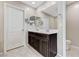 Bathroom featuring a double vanity and ample lighting at 2531 Dollison Ave, North Las Vegas, NV 89081