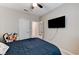 Cozy bedroom featuring a double bed, ceiling fan, and ample space at 2531 Dollison Ave, North Las Vegas, NV 89081