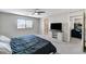 Large bedroom with carpet flooring, bright light, and ceiling fan at 2531 Dollison Ave, North Las Vegas, NV 89081