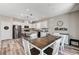 Bright kitchen with stainless steel appliances, granite countertops, and breakfast table at 2531 Dollison Ave, North Las Vegas, NV 89081