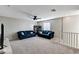 Spacious living area illuminated by natural light, with comfortable seating and neutral decor at 2531 Dollison Ave, North Las Vegas, NV 89081