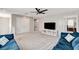 Cozy living room with comfortable couches, neutral carpet and bright lighting at 2531 Dollison Ave, North Las Vegas, NV 89081