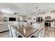 Bright, open-concept living space showcasing modern kitchen and dining area with sleek appliances at 2531 Dollison Ave, North Las Vegas, NV 89081
