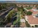 Aerial view features bocce ball courts next to the community center, complete with shady spots and desert trees at 2624 Spalding Dr, Las Vegas, NV 89134