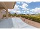 Wide view of back patio with gravel landscaping, mountain views, and low-maintenance desert plants at 2624 Spalding Dr, Las Vegas, NV 89134