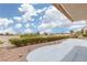 Backyard featuring extended patio and manicured privacy landscaping at 2624 Spalding Dr, Las Vegas, NV 89134