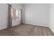 A sun-lit bedroom with neutral carpet and a bright window, offering a serene space for rest and relaxation at 2624 Spalding Dr, Las Vegas, NV 89134