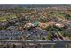 Aerial showcasing tennis courts, pool, and community buildings, highlighting an active community at 2624 Spalding Dr, Las Vegas, NV 89134