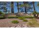 Welcoming entrance to community center with lush landscaping, creating an inviting atmosphere at 2624 Spalding Dr, Las Vegas, NV 89134