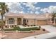 Beautiful single-story home with a well-maintained front yard and desert landscaping at 2624 Spalding Dr, Las Vegas, NV 89134