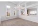 Bright living room with large windows and a view to other rooms at 2624 Spalding Dr, Las Vegas, NV 89134