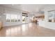 Spacious living room with tile floors, access to backyard, and a bar with seating at 2624 Spalding Dr, Las Vegas, NV 89134