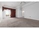 Spacious main bedroom with carpet, trey ceiling, and access to the backyard at 2624 Spalding Dr, Las Vegas, NV 89134
