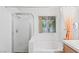 Bathroom featuring glass door shower and bathtub at 2707 Wild Breeze Ct, North Las Vegas, NV 89031