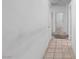 Hallway featuring tile flooring and neutral wall color at 2707 Wild Breeze Ct, North Las Vegas, NV 89031
