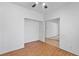 Empty living room featuring wood floors and bare white walls at 2707 Wild Breeze Ct, North Las Vegas, NV 89031