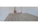 Spacious bedroom with neutral carpet and a view of the hallway and other rooms at 2747 Tahiti Grape Way # 2, Las Vegas, NV 89183