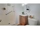 Bathroom featuring a shower and vanity with a wood cabinet at 4047 Maple Hill Rd, Las Vegas, NV 89115