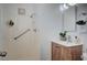 Bright bathroom featuring a shower and wood vanity cabinet, and neutral decor at 4047 Maple Hill Rd, Las Vegas, NV 89115