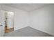 Bedroom with neutral carpet and an adjoining doorway to a bathroom at 4047 Maple Hill Rd, Las Vegas, NV 89115