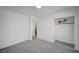 Carpeted bedroom with a built in shelf and view of a doorway at 4047 Maple Hill Rd, Las Vegas, NV 89115