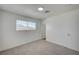 Neutral bedroom with carpet, fresh paint, and natural light offers a blank canvas for comfortable living and personalization at 4047 Maple Hill Rd, Las Vegas, NV 89115