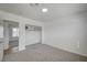 Clean bedroom with neutral carpet and a closet, offering a blank canvas for personalization and comfortable living at 4047 Maple Hill Rd, Las Vegas, NV 89115