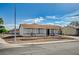 A single-story home with neat desert landscaping and a tidy brick border at 4047 Maple Hill Rd, Las Vegas, NV 89115