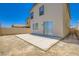 Spacious backyard with concrete patio and sliding glass door, perfect for outdoor living and entertaining at 4118 Beech Family St, Las Vegas, NV 89115