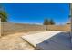 Enclosed backyard with concrete patio, block wall, and plenty of space for entertaining and outdoor activities at 4118 Beech Family St, Las Vegas, NV 89115