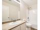 Bathroom featuring a sink vanity, a large mirror, and a shower-tub combination at 4118 Beech Family St, Las Vegas, NV 89115