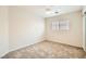 Bedroom with neutral walls, plush carpet, and a window providing natural light at 4118 Beech Family St, Las Vegas, NV 89115