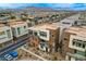 Showcasing the modern community design, landscaping, and mountain views from an aerial perspective at 4336 Guava Ct # 0, Las Vegas, NV 89135