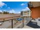 Relaxing balcony featuring stylish outdoor furniture and a view of the meticulously landscaped community at 4336 Guava Ct # 0, Las Vegas, NV 89135