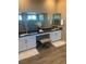 Bathroom featuring double sink vanity, large mirrors, and modern fixtures at 4336 Guava Ct # 0, Las Vegas, NV 89135
