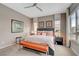 This bedroom features a ceiling fan, natural light, area rug, and bench at 4336 Guava Ct # 0, Las Vegas, NV 89135