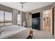Spacious bedroom showcasing large windows, neutral walls, and ample closet space at 4336 Guava Ct # 0, Las Vegas, NV 89135