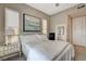 This bedroom has modern decor, an area rug, and natural lighting at 4336 Guava Ct # 0, Las Vegas, NV 89135