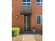 Inviting front entrance with a brick pathway, stylish door, and manicured greenery at 4336 Guava Ct # 0, Las Vegas, NV 89135