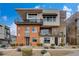 Modern three-story home featuring dual balconies and contemporary architectural design at 4336 Guava Ct # 0, Las Vegas, NV 89135