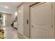 Hallway with neutral walls, interior door, and an elevator entrance adding convenience to the home at 4336 Guava Ct # 0, Las Vegas, NV 89135