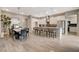 Open-concept living area featuring a modern kitchen, dining space, and an inviting design at 4336 Guava Ct # 0, Las Vegas, NV 89135