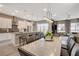 Contemporary living space with kitchen, dining and living room featuring an open floor plan and access to outdoor living at 4336 Guava Ct # 0, Las Vegas, NV 89135