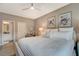 Well-lit main bedroom with elegant decor and en suite bathroom access at 4336 Guava Ct # 0, Las Vegas, NV 89135