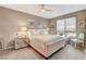 Relaxing main bedroom featuring a comfortable queen-sized bed and tasteful decor at 4336 Guava Ct # 0, Las Vegas, NV 89135