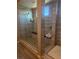 Luxurious walk-in shower with elegant tile, seating and modern fixtures at 4336 Guava Ct # 0, Las Vegas, NV 89135