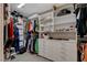 Walk-in closet boasts ample shelving, hanging space, and storage drawers for organized wardrobe at 4336 Guava Ct # 0, Las Vegas, NV 89135