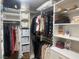 Spacious walk-in closet with built-in shelving, hanging rods, and storage baskets at 4336 Guava Ct # 0, Las Vegas, NV 89135