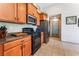 Well-equipped kitchen features stainless steel appliances, granite countertops, and ample cabinet storage at 4508 Dragon Fly Creek Ave, North Las Vegas, NV 89031